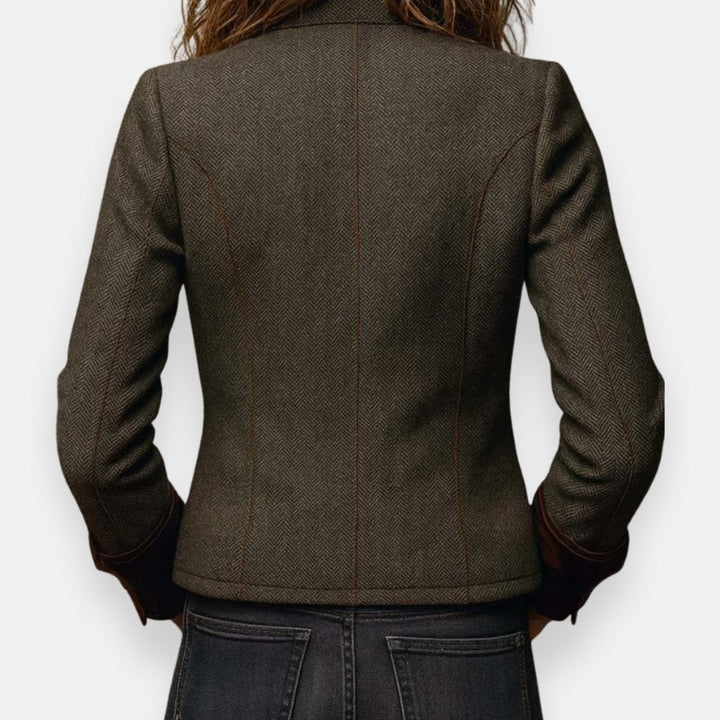 Génesis | Elegante chaqueta de tweed con detalles de terciopelo