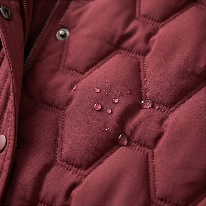 Lumière | Abrigo largo de plumas con capucha